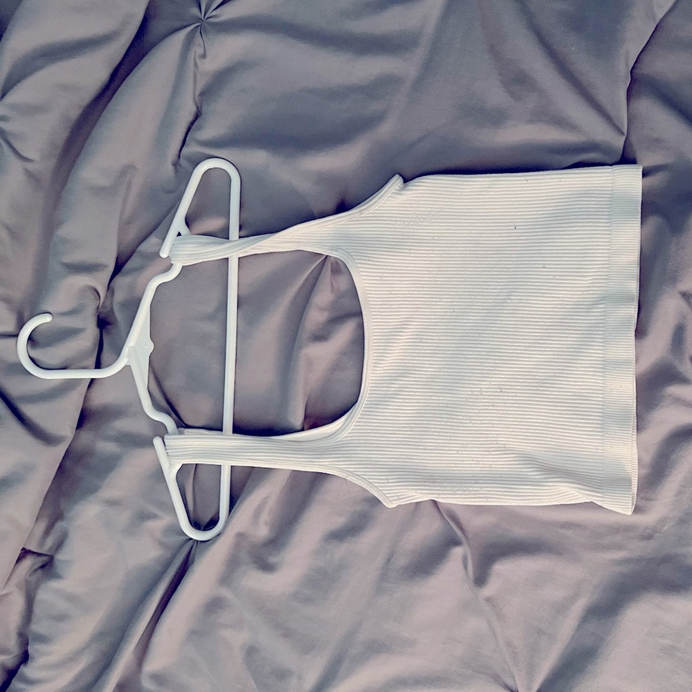 Cropped white tank top. Size small I believe it was from American eagle